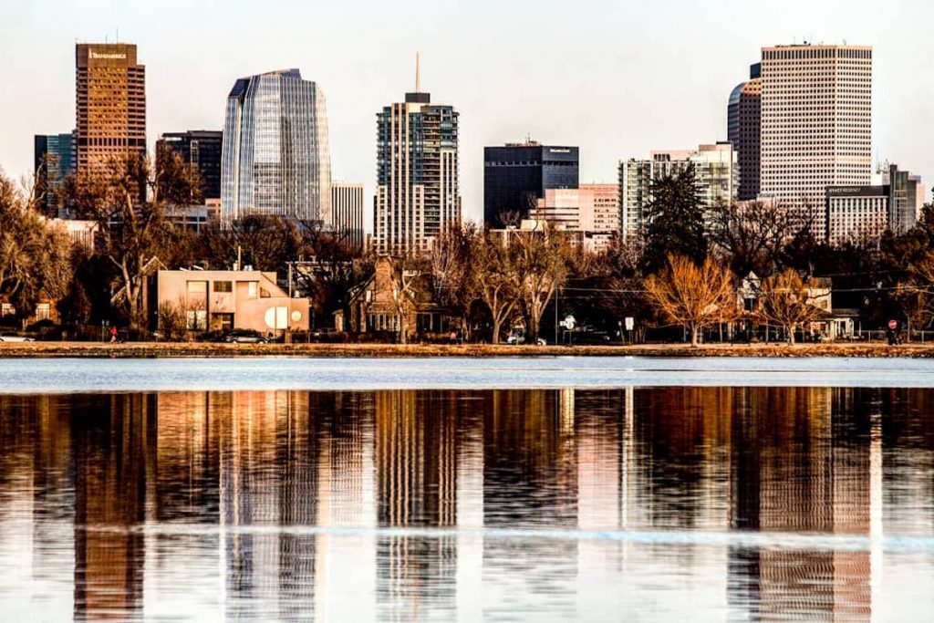 Sloan's Lake in the foreground with the cityscape behind it