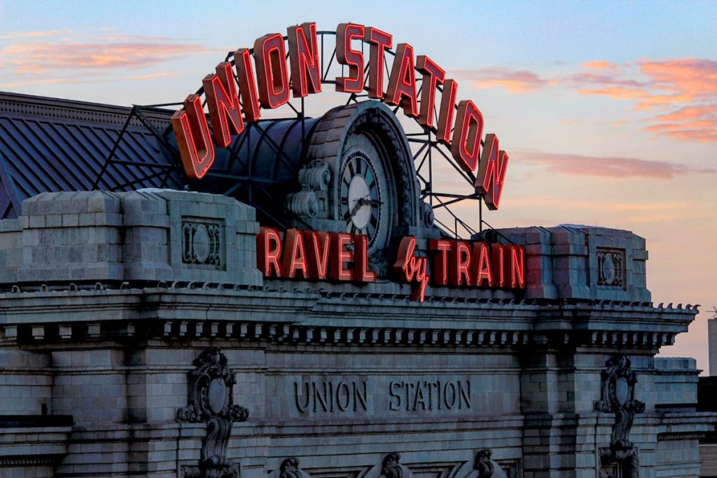 Close-up photo of the Union Station sign atop the train station