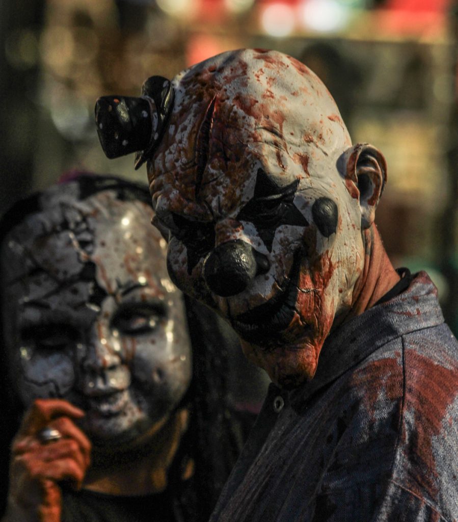 Two people dressed up for the Zombie Crawl